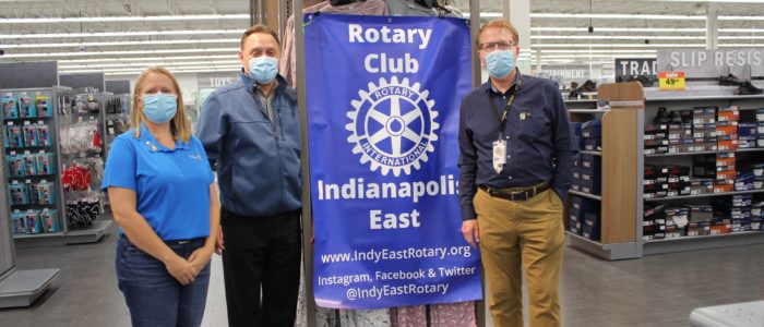 Members Kathryn Basham, Marc Hackett and Martinlow Spaulding pose for a picture during our Shoes for Students event